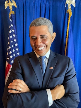 Reggie Brown as Barack Obama